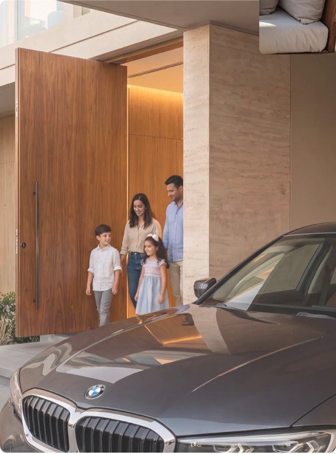 A family leaving their villa